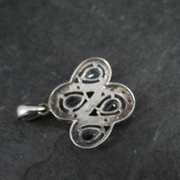 Unique Sterling Silver Blue Topaz & Diamond Pendant