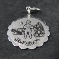 1976 Sundays Child Charm Sarah Coventry