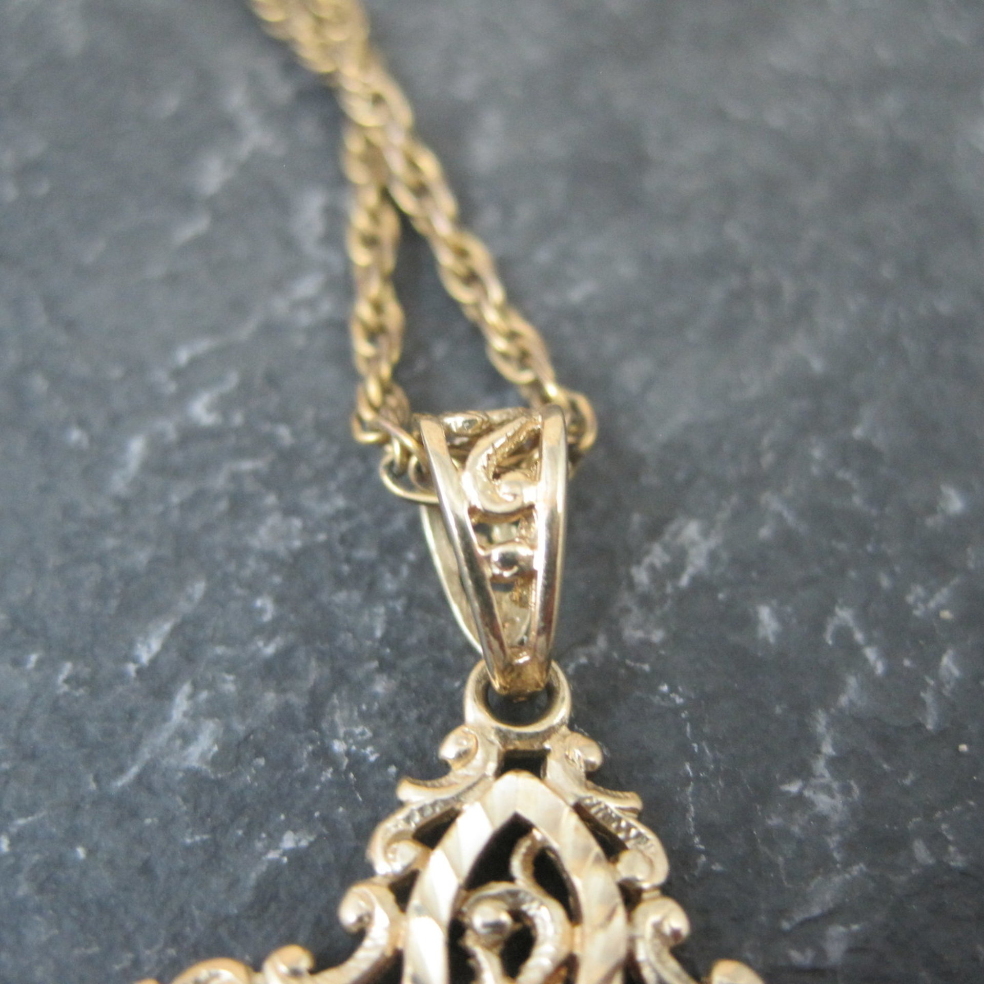 Vintage 10K Diamond Cut Filigree Cross Pendant