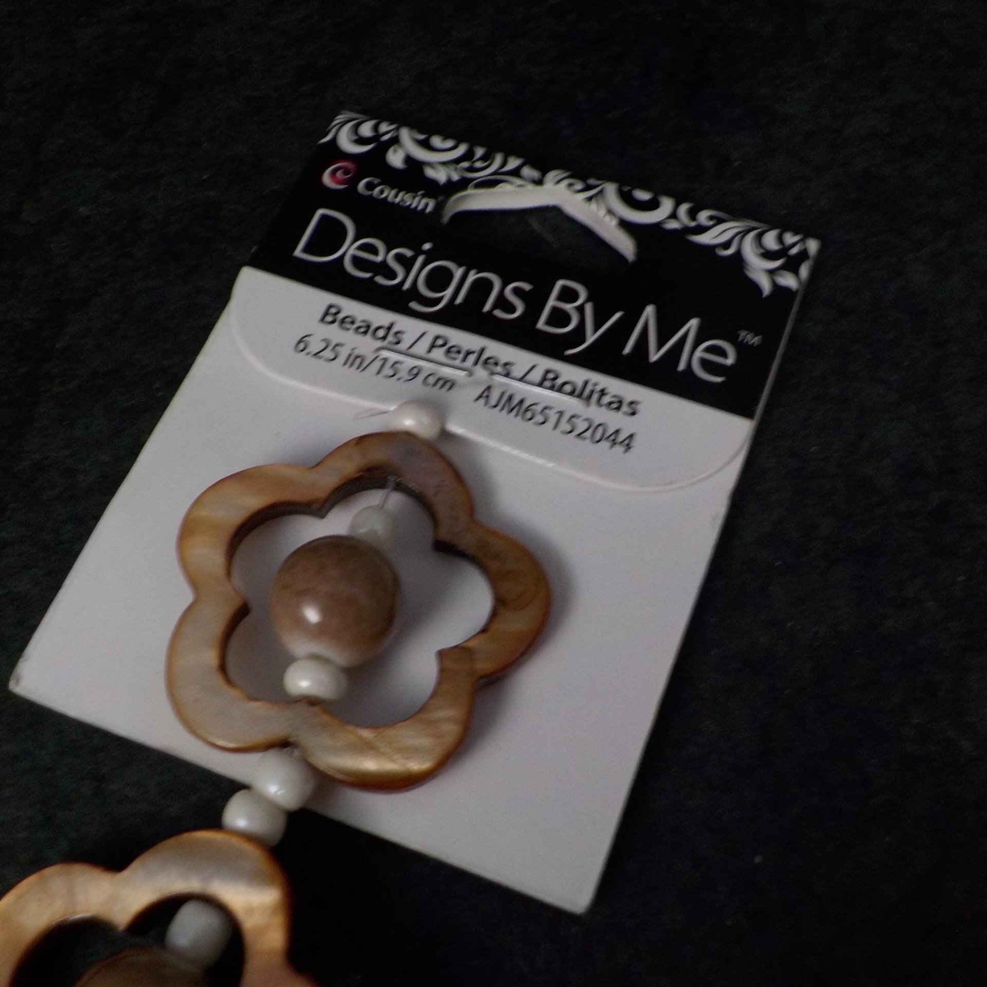 Mother of Pearl Flower and Ceramic Bead Strand Cousins Discontinued