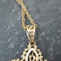 Vintage 10K Diamond Cut Filigree Cross Pendant