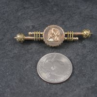 Antique 10K Peacock Bar Brooch