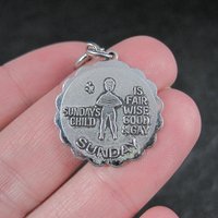 1976 Sundays Child Charm Sarah Coventry