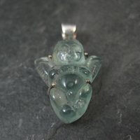 Carved Blue Topaz Cherub Pendant