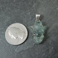 Carved Blue Topaz Cherub Pendant