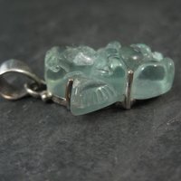 Carved Blue Topaz Cherub Pendant