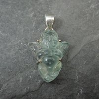 Carved Blue Topaz Cherub Pendant