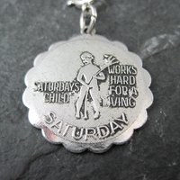 1976 Saturdays Child Charm Sarah Coventry