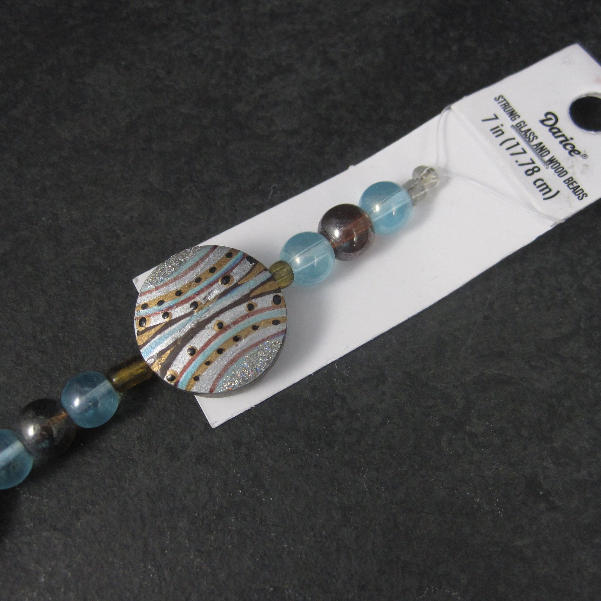 Darice Blue Sun Bead Strand Glass and Painted Wood