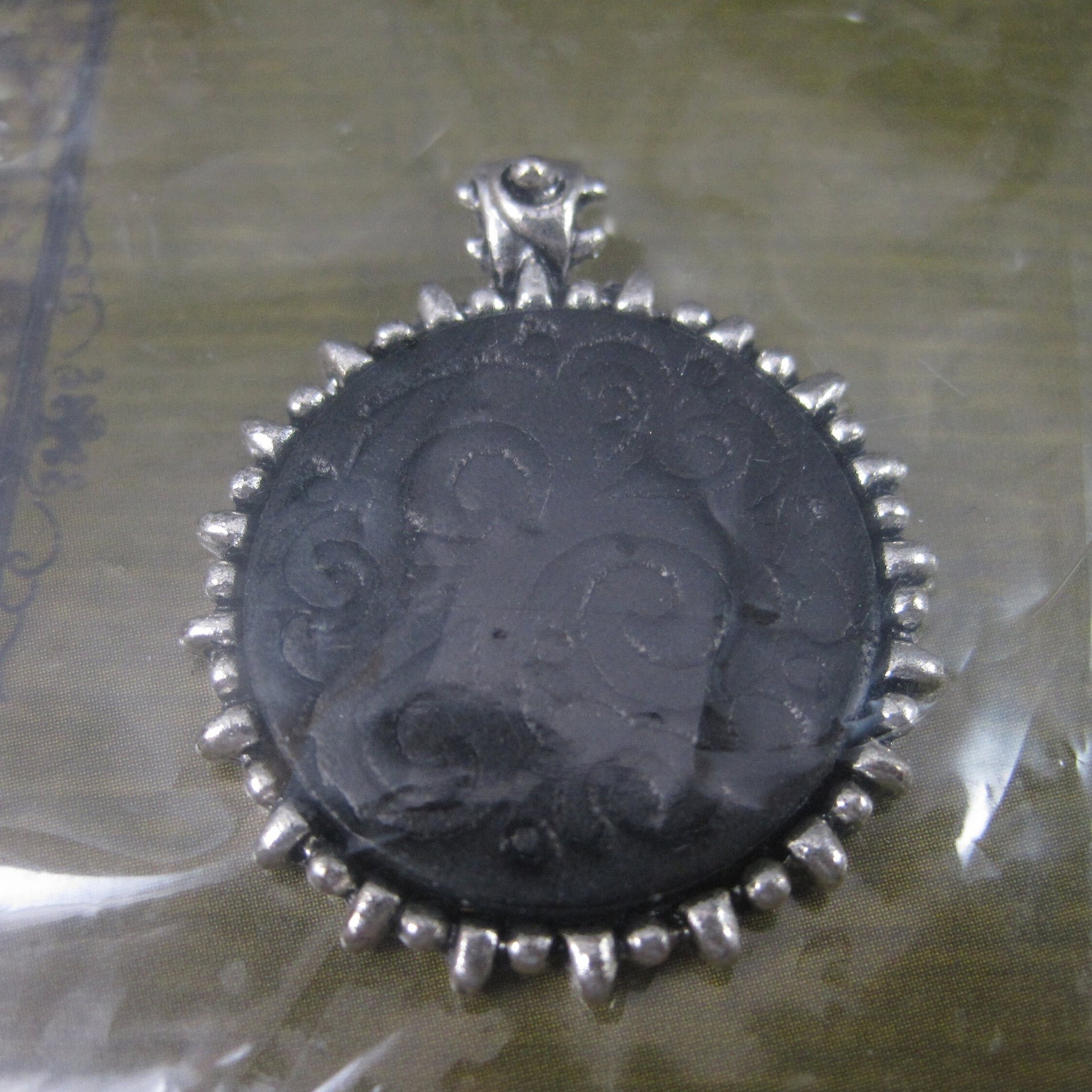 Black Leather Debossed Silver Plated Pendant by On-A-Cord