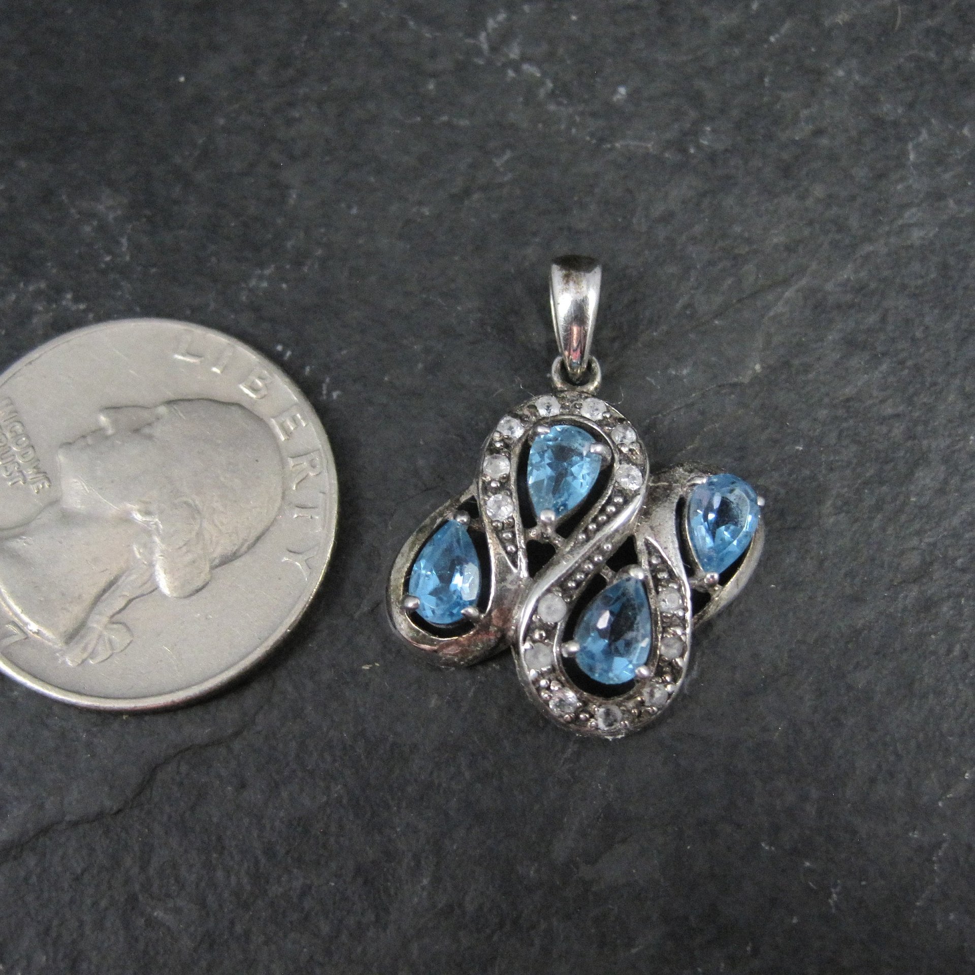 Unique Sterling Silver Blue Topaz & Diamond Pendant