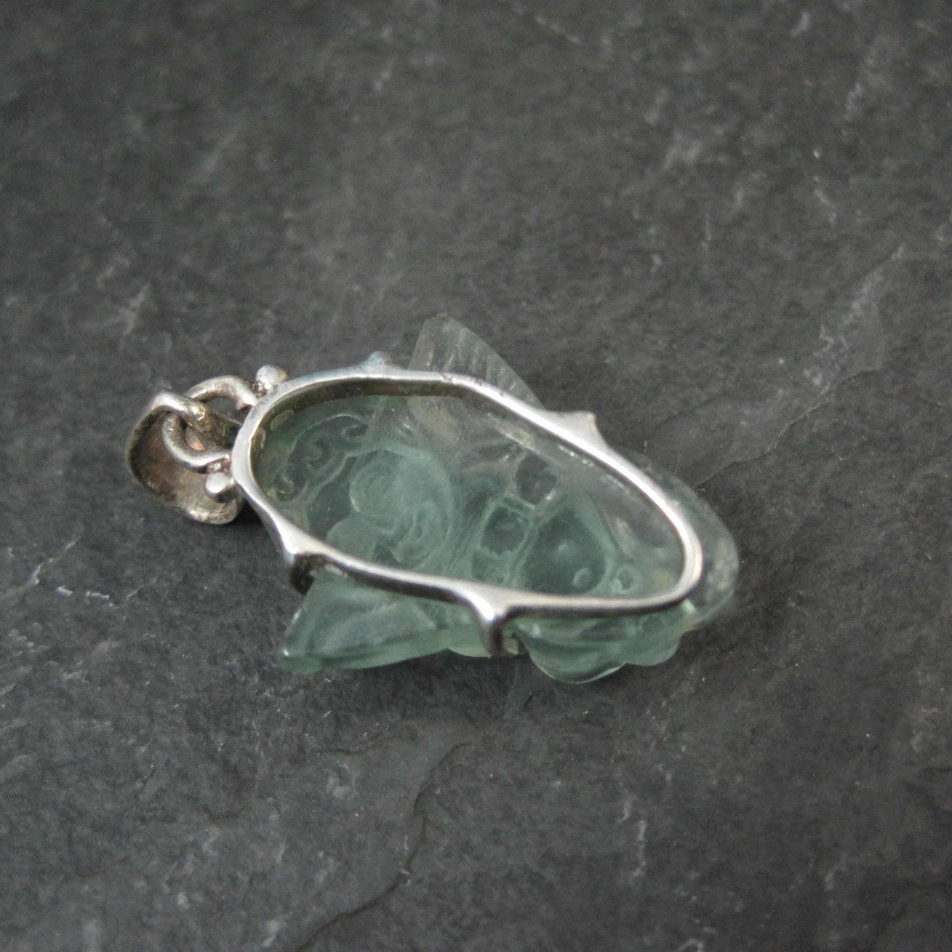 Carved Blue Topaz Cherub Pendant