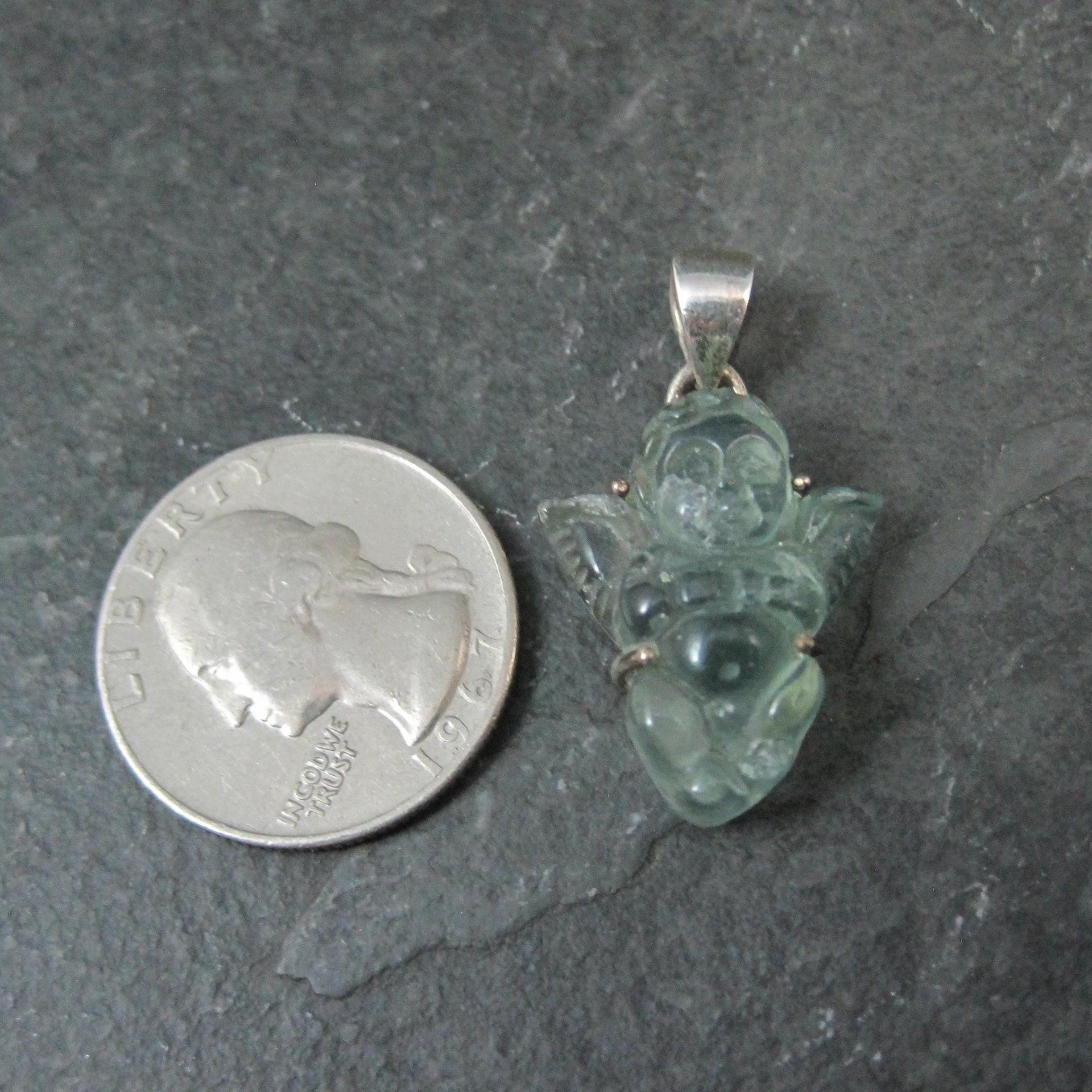 Carved Blue Topaz Cherub Pendant