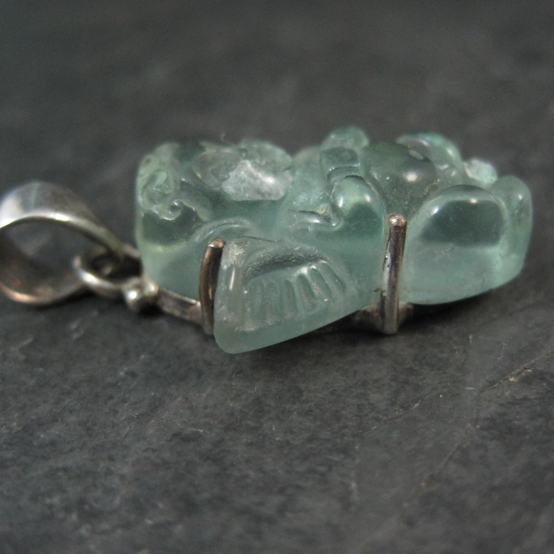 Carved Blue Topaz Cherub Pendant