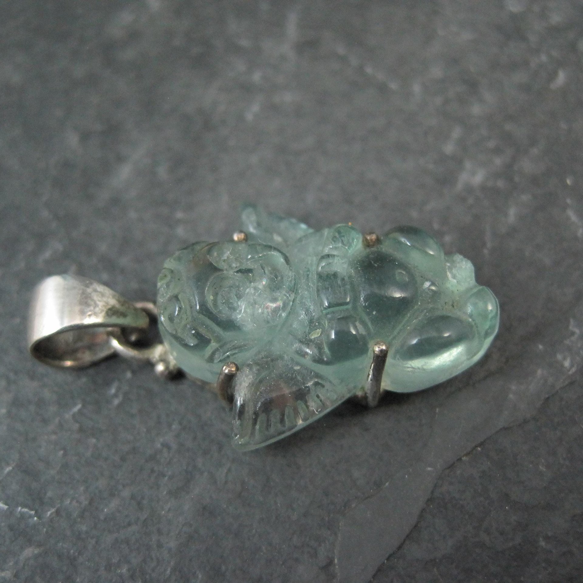 Carved Blue Topaz Cherub Pendant