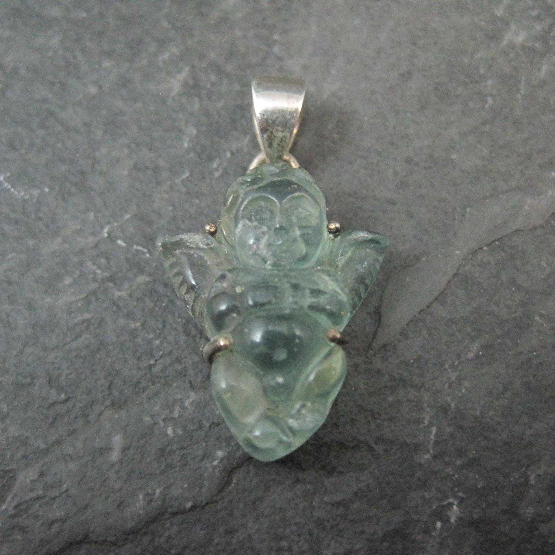 Carved Blue Topaz Cherub Pendant