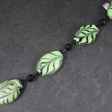 Green and Black Lampworked Glass Bead Strand Cousins