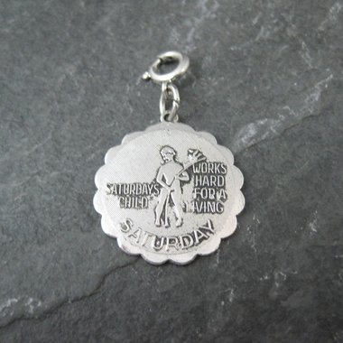 1976 Saturdays Child Charm Sarah Coventry